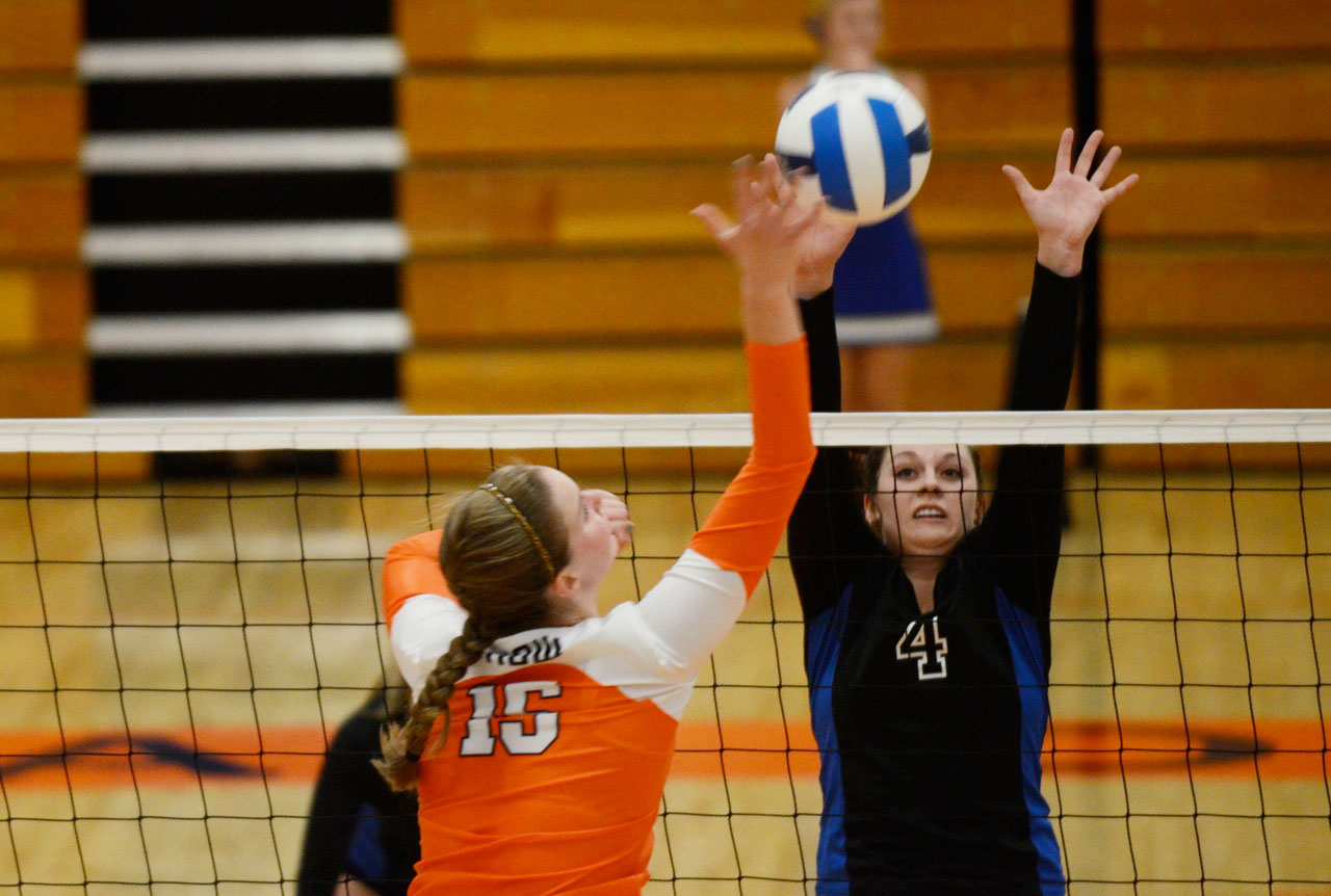 Volleyball: SLCC badgers Snow College for the win Hannah Wade goes for a block as SLCC melts Snow College.