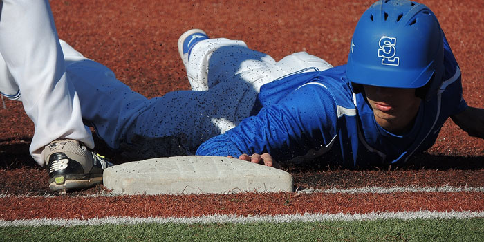 Coaching staff sets standard for SLCC baseball Dives back into first base
