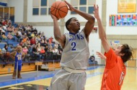 Men’s Basketball continues to dominate league Tyrell Corbin slashes to the basket and finishes strong.