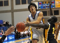 SLCC Basketball player adapts to life in America Sean Chow drives to the basket