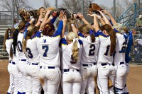 SLCC softball beats Weatherford, faces Chipola College in next round Bruins softball team huddles together